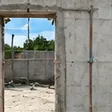 Ouverture de porte sciée dans un voile en béton armé de 25 cm